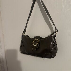 Small dark green faux leather handbag. Excellent shape.